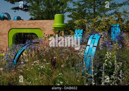 Hampton Court, UK. 8th July 2013. The Ecover Garden at RHS Hampton Court Palace Flower Show 2013 on Press Day, Monday 8th July 2013 in London, UK. The Gold medal winning garden designed by Matthew Childs and sponsored by Ecover also won the Best in Show Award. Credit:  Miriam Heppell/Alamy Live News Stock Photo
