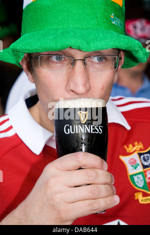 Man drinking a pint of Guinness stout beer on a Stag weekend in Dublin, Eire / Ireland. Stock Photo