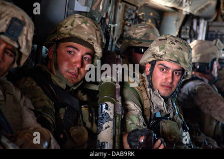 Georgian soldiers assigned to the 33rd Light Infantry Battalion aboard a MV-22B Osprey tiltrotor aircraft after extraction during Operation Northern Lion II July 3, 2013 in Helmand province, Afghanistan. Stock Photo