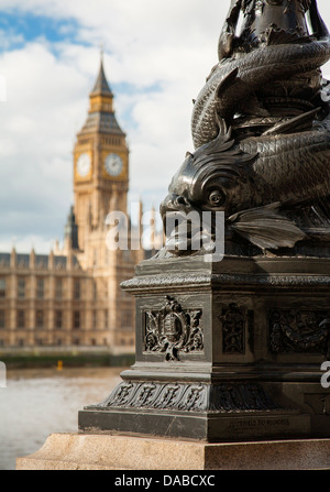 Ornate sturgeon lamp standard on the Albert Embankment opposite the Houses of Parliament in London UK Stock Photo