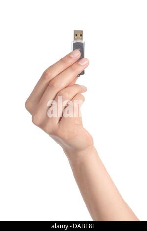 Woman hand holding up a flash drive isolated on a white background Stock Photo
