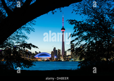 City skyline at dusk from near the Centre Island Ferry dock, Toronto Island Park, Toronto, Ontario, Canada. Stock Photo