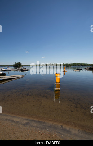 water slides and boats in a lake. Stock Photo