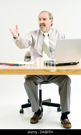 Businessman extending his hand to client Stock Photo