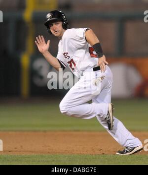 Albuquerque, US. 9th July, 2013. Isotopes center fielder Matt Angle races to third base in the fourth inning of the game against Nashville at Isotopes Park on Tuesday, July 9, 2013.  Credit:  Greg Sorber/Albuquerque Journal/ZUMAPRESS.com/Alamy Live News Stock Photo