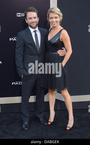 Hollywood, California, USA. 09th July, 2013. Charlie Day and Mary Elizabeth Ellis arrive at the Los Angeles film premiere for 'Pacific Rim' at the Dolby Theatre, Hollywood, California, USA. Credit:  Sydney Alford/Alamy Live News Stock Photo