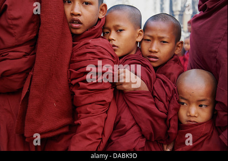 Monks in procession during Full Moon Festival, Patho Ananda temple, Bagan (Pagan), Myanmar (Burma), Asia Stock Photo