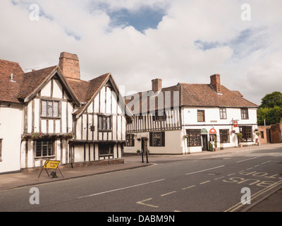 Half-timbered wooden shops and houses in the medieval village Lavenham, Suffolk, UK Stock Photo