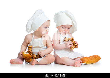 funny cooks babies boy and girl Stock Photo