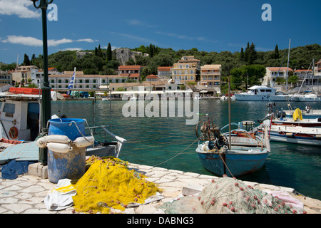 Boats in the harbour in Kassiopi on the northeast coast of Corfu, The Ionian Islands, Greek Islands, Greece, Europe Stock Photo