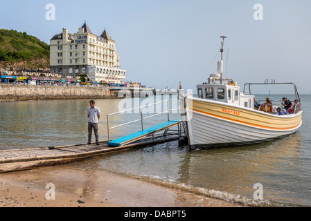 The little boat Sea-Jay ready fro trips round the Ormes Bay of Llandudno in North Wales. Stock Photo