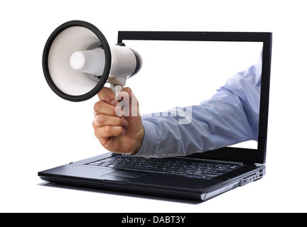 Megaphone through laptop monitor Stock Photo