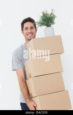 Man carrying boxes because he is moving Stock Photo