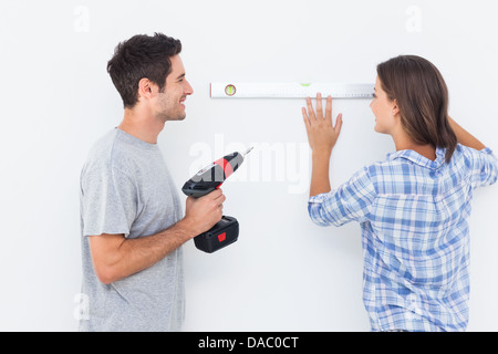 Man and his wife doing diy together Stock Photo