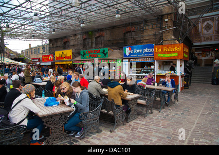 Eating area in front of the food stalls Stables Market in Camden Town district London England Britain UK Europe Stock Photo