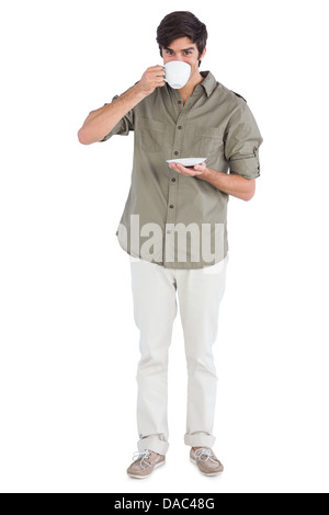 Smiling man drinking coffee Stock Photo