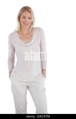 Smiling blonde woman posing for the camera Stock Photo