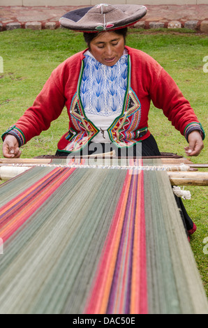 Traditionally red dress costume clothing sweater Inca woman weaver ...