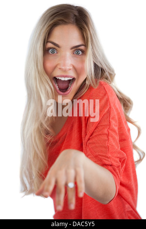 Excited woman showing her engagement ring Stock Photo