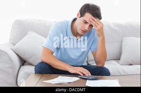 Man doing his accounts Stock Photo
