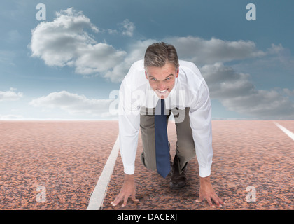 Businessman ready to run Stock Photo