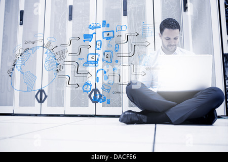 Man sitting next to a drawing of a planet Stock Photo