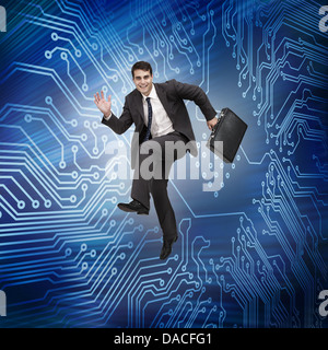 Businessman jumping in the air Stock Photo