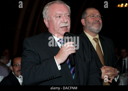 Dr. Michael Häupl, Mayor and Governor of Vienna (L), speaks in the presence of the Muslim Community representatives. Stock Photo