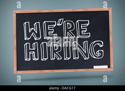 We are hiring written on blackboard Stock Photo