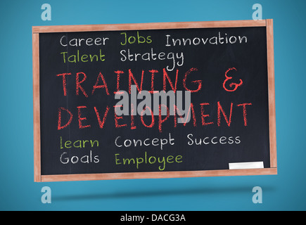 Training and development terms written on a chalkboard Stock Photo