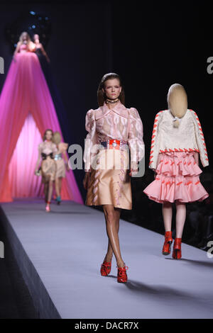 A model wears a creation by Dutch fashion designer Iris van Herpen as ...