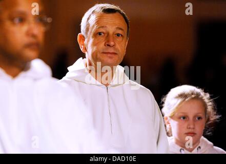 Abbot of Taize Frere Alois takes part in a church service in a hall at the trade fair site during the 34th European Youth Meeting Taize in Berlin, Germany, 29 December 2011. At the invitation of the churches and the senate the youth meeting takes place in Berlin from 28 December 2011 till 01 January 2012. Taize is an international ecumenical order for males which accepts all nation Stock Photo