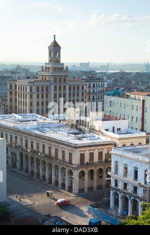 View over rooftops of Havana towards The Bacardi Building from the 9th floor restaurant of Hotel Seville, Havana Centro, Cuba Stock Photo