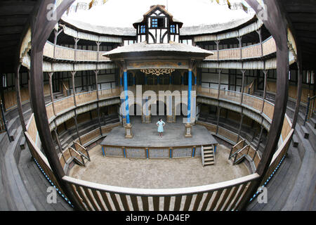 FILE - An archive picture dated 06 August 2010 shows a replica of the Globe Theatre on the film set of Roland Emmerich's Shakespeare movie 'Anonymous' at the Studios Babelsberg in Potsdam, Germany. The set highlights the art and skill of the set designers and set dressers. They built a three-storey wooden theatre in the elizabethan style for the Hollywood director's movie which pre Stock Photo