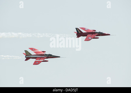 Two Vintage Folland Gnat Military Jet Trainers, the Gnat Display Team fly in formation at the 2013 RAF Waddington Air Show Stock Photo