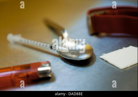 Equipment for heroin consumption is displayed in the drug-use room of the Krisenhilfe e.V., Bochum, Germany, 11 October 2011. The new and dangerous drug is called Crocodile. Trade of the extremely dangerous heroin substitute has spilled to Germany. The artificially produced drug from Russia, also known as 'Croc', has appeared in the Ruhr area. Photo: Marcus Simaitis Stock Photo