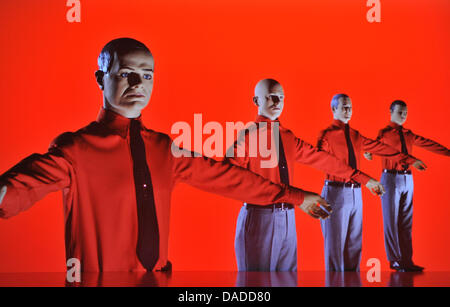 A 3D video installation, in which the musicians from the band Kraftwerk are portrayed, is seen during the video press preview of the exhibition 'Kraftwek 3-D Video Installation' at the Kunstbau of the Municipal Gallery in Lenbachhaus in Munich, Germany, 13 October 2011. The design of the exhibition is meant to make the minimalistic sounds and images of Kraftwerk tangible to a broad Stock Photo
