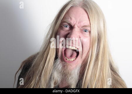 Bass guitar player and singer Marco Hietala of the Finnish symphonic metal band 'Nightwish' grimaces in Berlin, Germany, 21 October 2011. Photo: Lutz Mueller-Bohlen Stock Photo