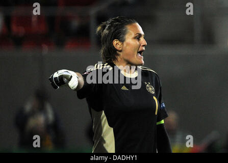 Germany's goalkeeper Nadine Angerer gestures during the international match between Germany and Sweden at Millerntor Stadium in Hamburg, Germany, 26 October 2011. Photo: ANGELIKA WARMUTH Stock Photo