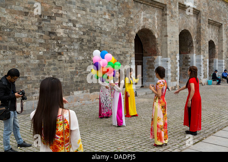 Vietnamese Girl with Balloons on the Ground of the Citadel of Thang in Hanoi, Vietnam Stock Photo
