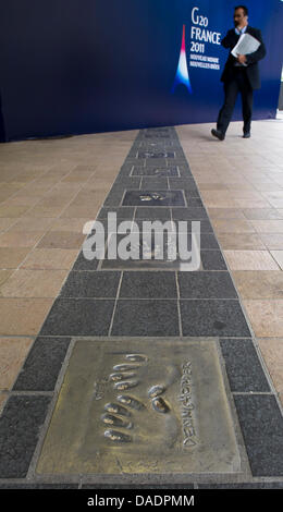 The 'Walk of Fame' with the handprints of famous movie stars stretches along the floor of the foyer near the entrance area to the press center at the 'Palais du Festival' in Cannes, France, 2 November 2011. The heads of states of the 20 leading economies in the world are going to meet at this year's G20 Summit which takes place in Cannes from 3 November to 4 November 2011. PHOTO: P Stock Photo