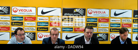 Martin Boerner (L-R), organization and events director for SG Dynamo Dresden, Andreas Ritter, club president, Volker Sholz, Press spokesman, and Volker Oppitz, managing director of SG Dynamo Dresden, take part in a press conference at Glueckgas Arena in Dresden, Germany, 02 November 2011. During the press conference, Oppitz as well as Boerner, organization and events director, comm Stock Photo