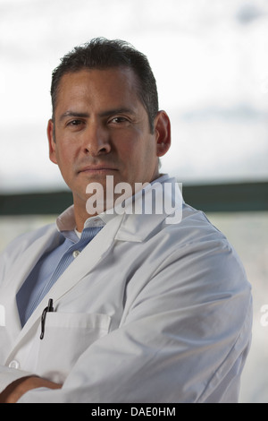 Mature man wearing lab coat, portrait Stock Photo