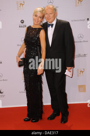 German actor Axel Milberg and his wife Judith arrive for the Bambi award in Wiesbaden, Germany, 10 November 2011. The Bambis are the main German media awards and are presented for the 63rd time. Photo: Jörg Carstensen dpa/lhe  +++(c) dpa - Bildfunk+++ Stock Photo