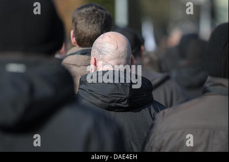 Participants of a neo-Nazi demonstration march through Wunsiedel, Germany, 13 November 2011. More than 350 people attended an inauguration of a memorial site in Wunsiedel and remembered the victims of the death marches from CC Buchenwald to the Concentration Camp in Flossenbuerg. At the same time, around 250 neo-Nazis took part in a demonstration. Photo: DAVID EBENER Stock Photo