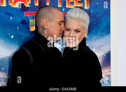 US singer and voice recording artist Alecia Beth Moore aka Pink and her husband Carey Hart arrive for the World Premiere of the movie 'Happy Feet Two' at Grauman's Chinese Theatre in Los Angeles, USA, on 13 November 2011. Photo: Hubert Boesl Stock Photo