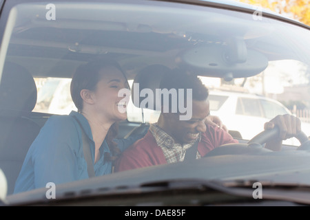 Young couple in car Stock Photo