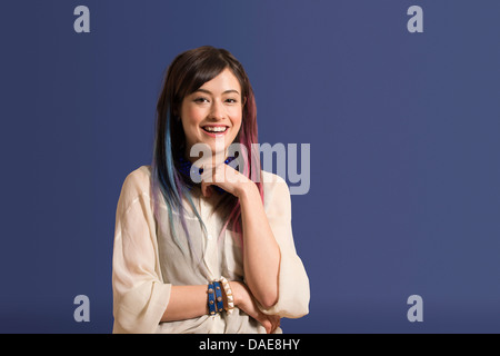 Portrait of young woman with dyed hair Stock Photo