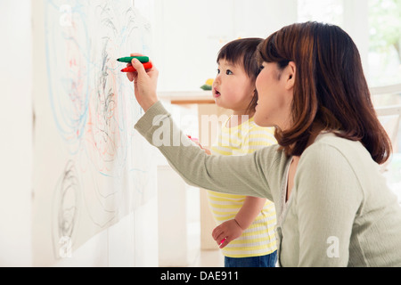 Mother and toddler drawing Stock Photo