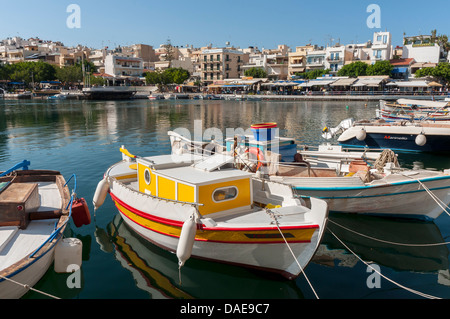 Fishing Boats on Lake Voulismeni, Agios Nikolaos, Crete, Greece Stock Photo